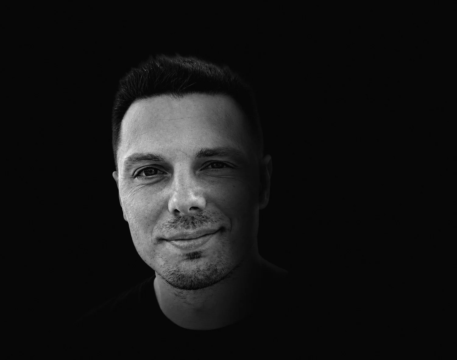 Black-and-white portrait of Laydan.